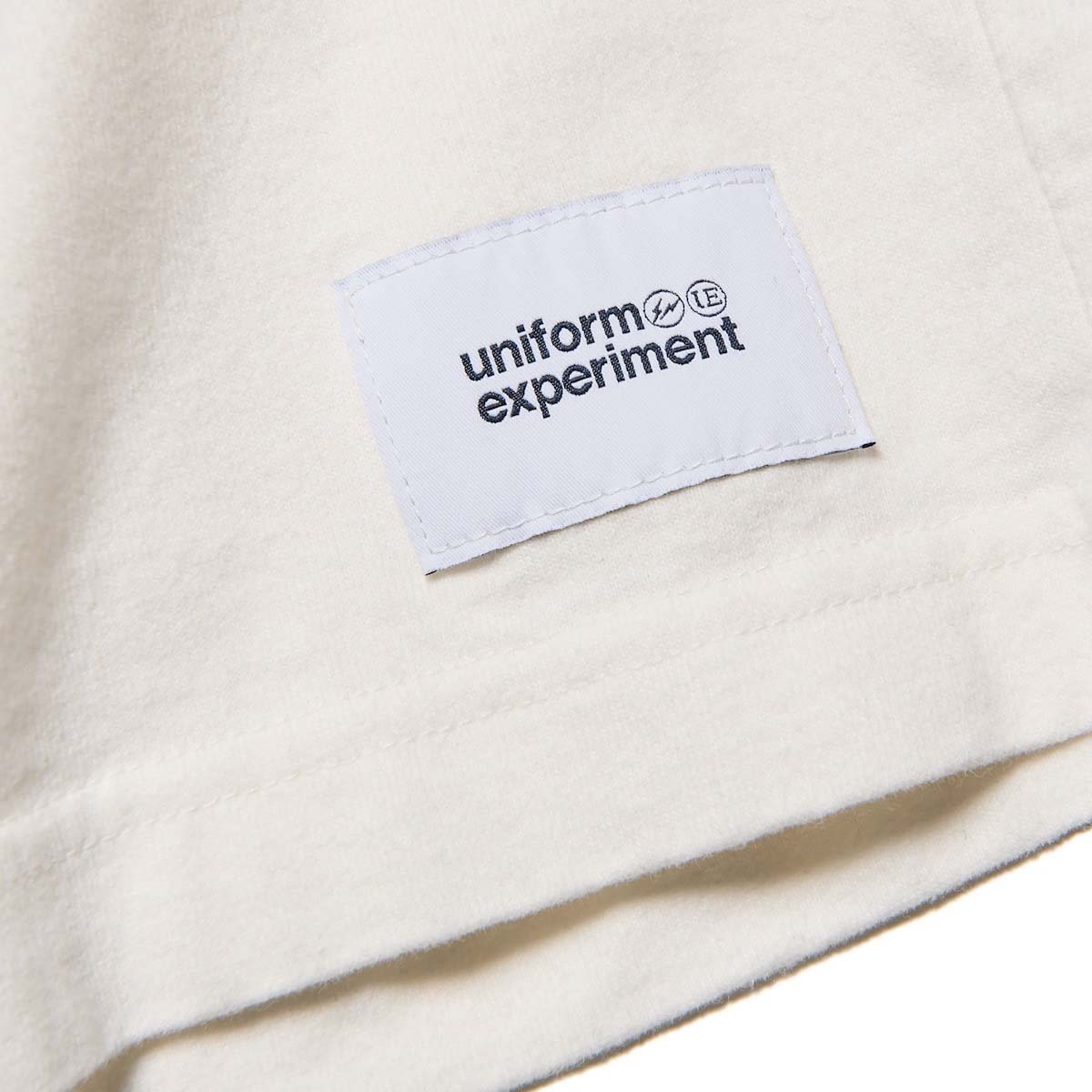 uniform experiment / UEN FOOTBALL TEE (White) 裾パッチ